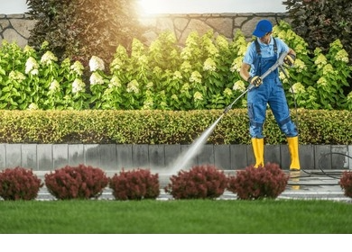 The Importance of Cleaning all Hard Surfaces around the Garden